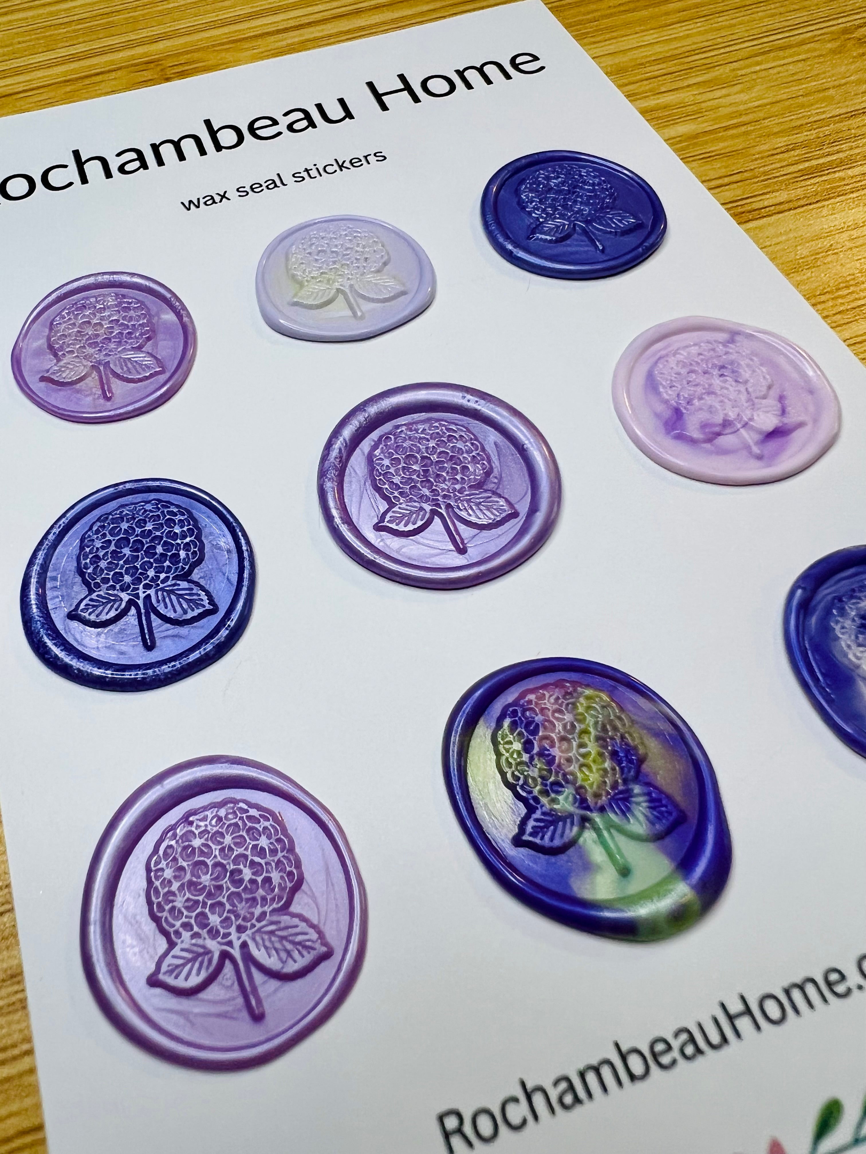 Close up view of the 6 Pack Card of the Hydrangea Bloom Wax Seal Stickers in a Purple Theme on a Rochambeau Home display card