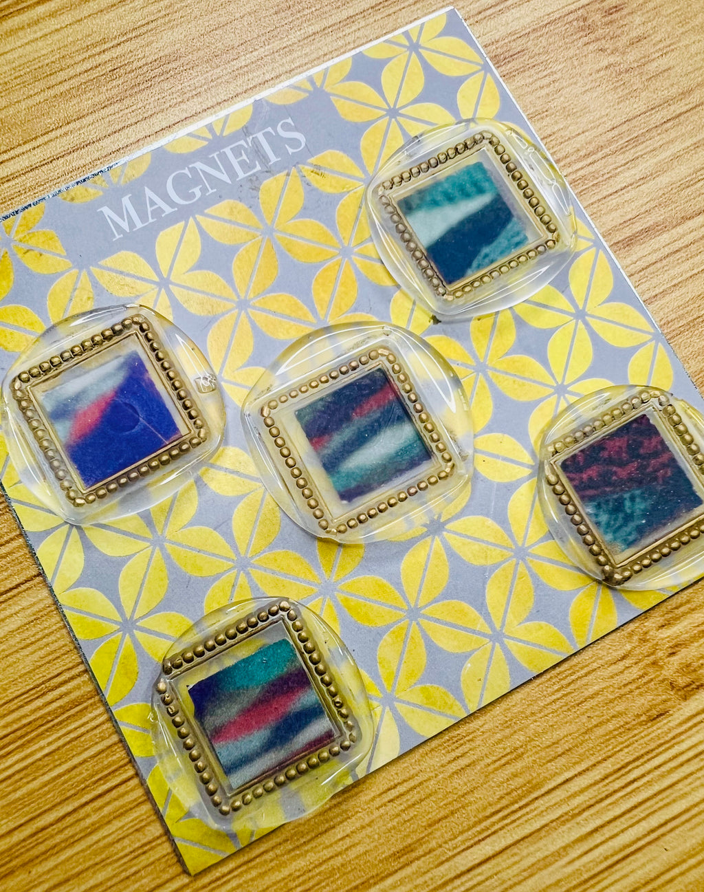 Set of four square wax seal magnets handcrafted by Rochambeau Home on a patterned card labeled 'MAGNETS'.