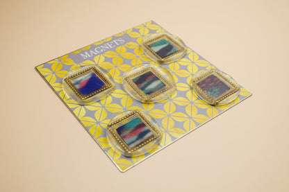 Set of five wax seal magnets with colorful and cozy stripes on a patterned card labeled 'Magnets'.