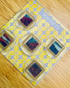Set of five wax seal magnets framed in a deep gold to create an art display inspired look
