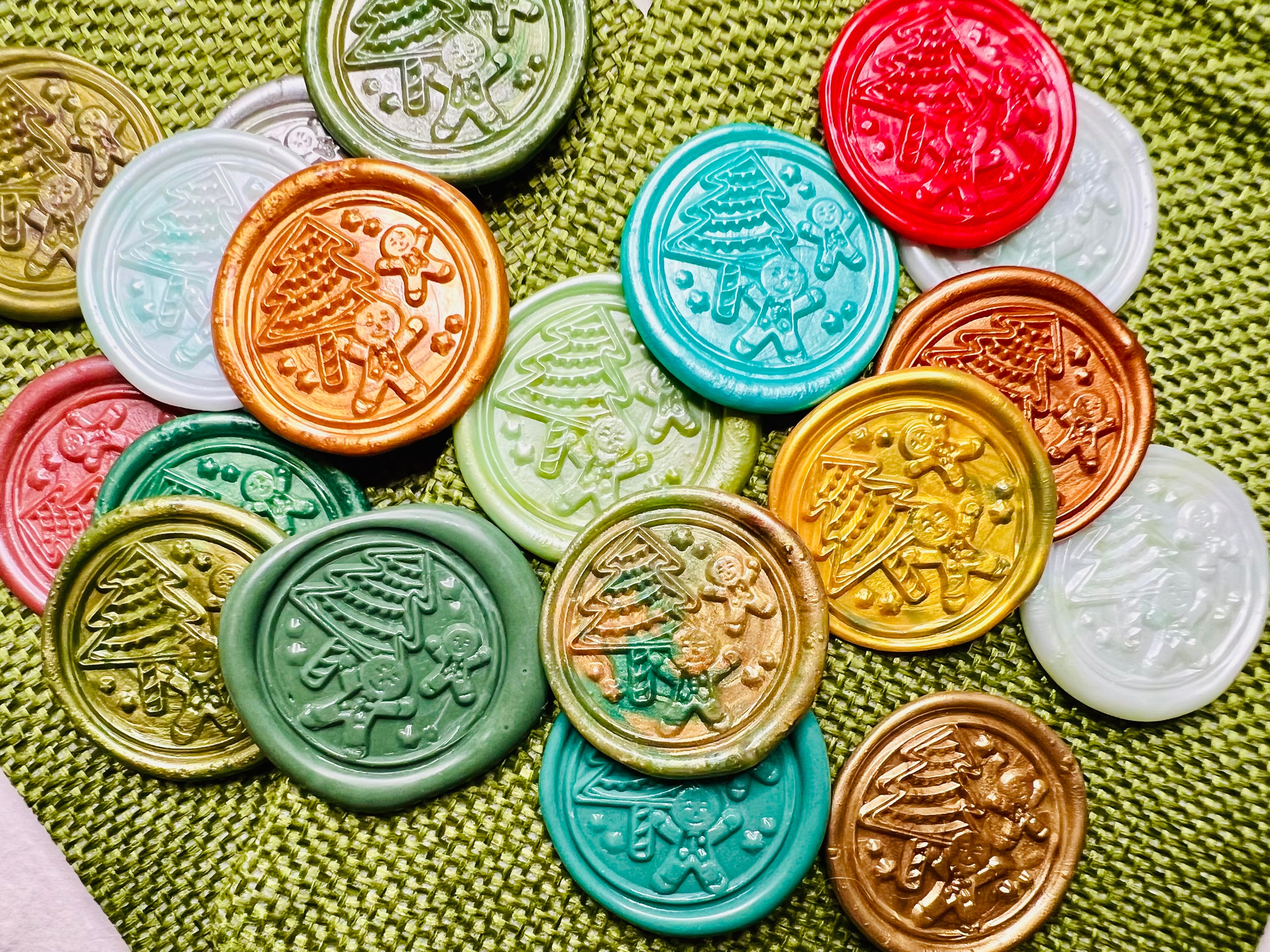 Cheerful Gingerbread Man embossed wax seal stickers with playful holiday details and created by Rochambeau Home