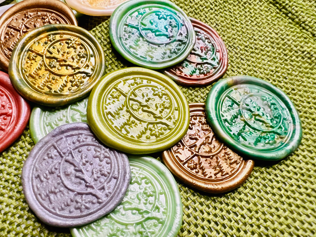 Close up view of the Santa dashing through the snow in his sleigh with reindeer wax seal stickers created by Rochambeau Home