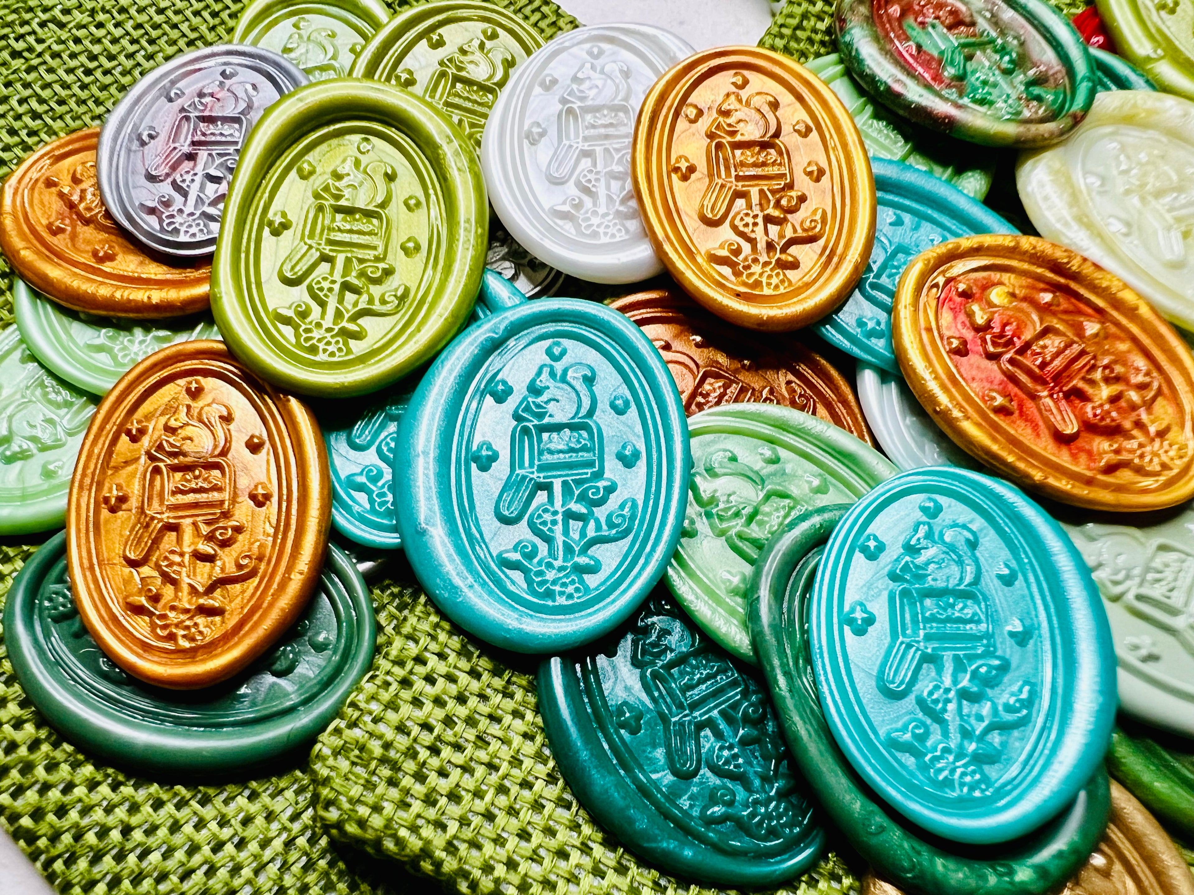 Holiday Squirrel Mail Christmas Wax Seal Stickers showcased on green burlap