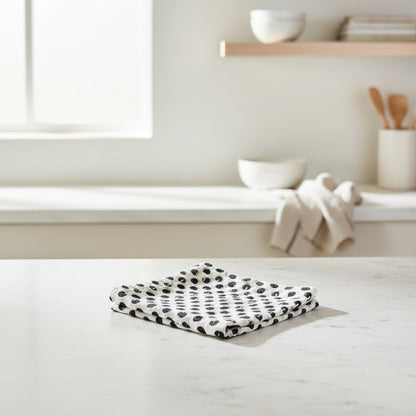 Polka dot fabric swatch on a neutral background