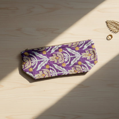 A large zippered Kantha cosmetic bag with deep purple colors and floral accents.