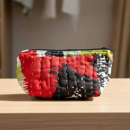 Medium Kantha zippered pouch with various colors and geometric designs on a neutral background.