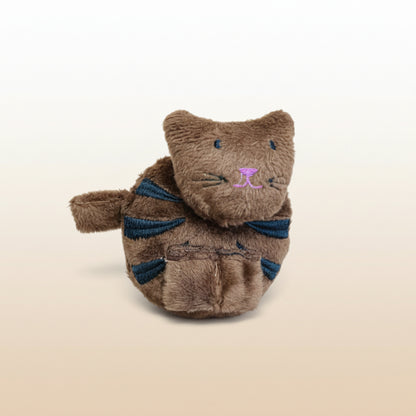 Brown plush cat measuring tape on a light gray background