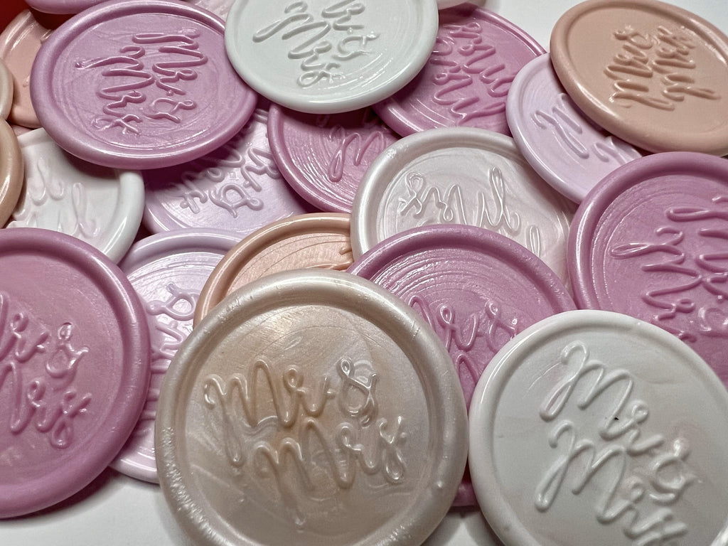 Handcrafted wax seals with a smooth finish, designed to add romance to your wedding day
