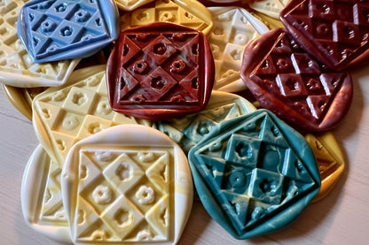 Cozy Quilted Floral embossed wax seal stickers in various colors on a neutral background.