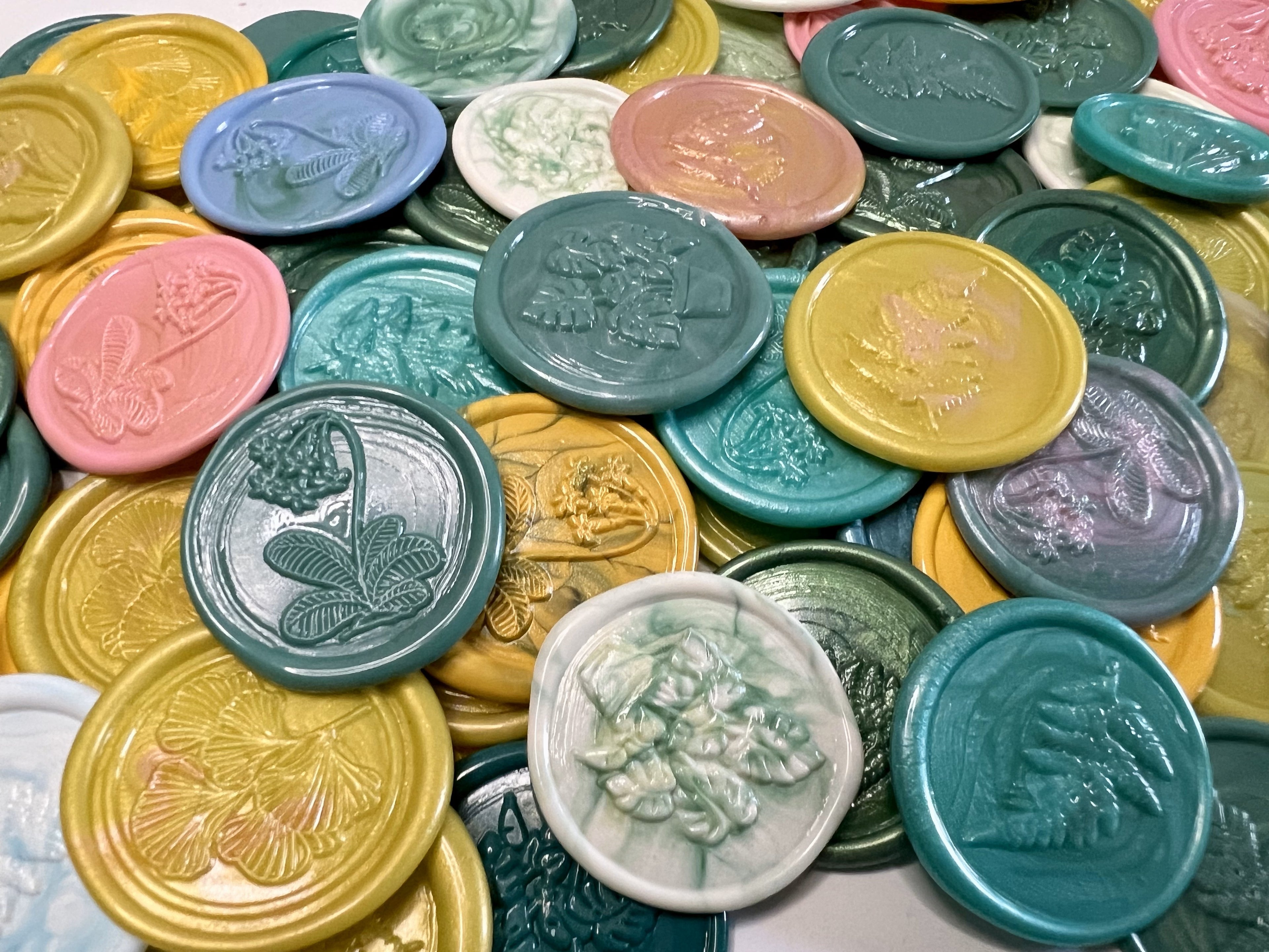 A variety of colorful and floral inspired wax seal stickers - each bag is a mystery as to which wax seal stickers you will receive!