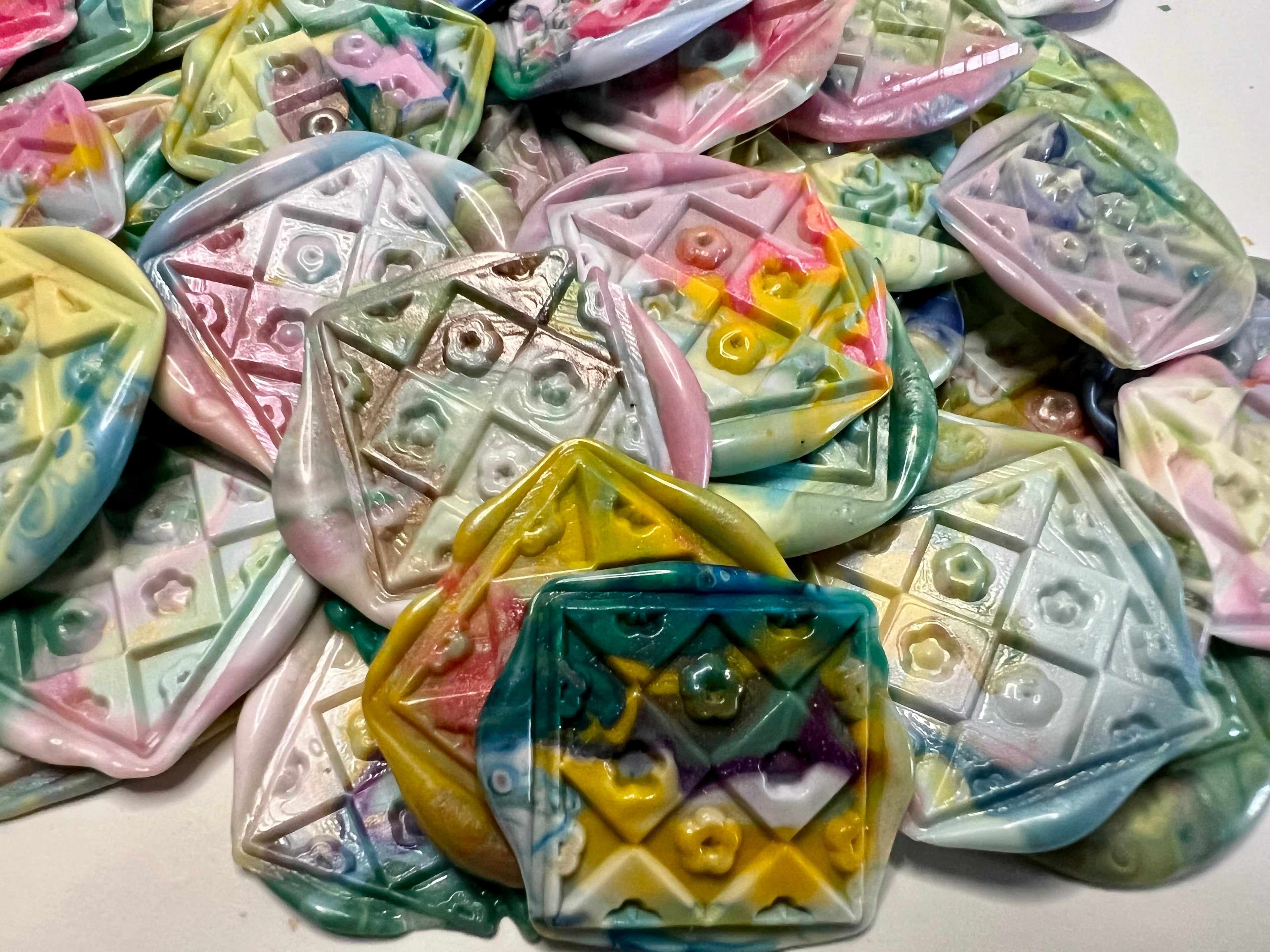 Colorful wax seal sticker with a quilted floral pattern and vibrant rainbow dots.