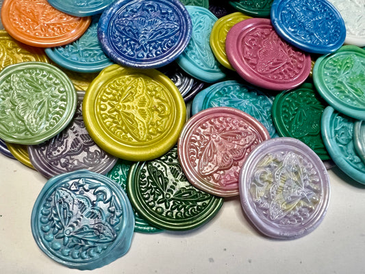 Set of 10 peel-and-stick wax seals with a lunar moth design, perfect for boho or enchanted themes.