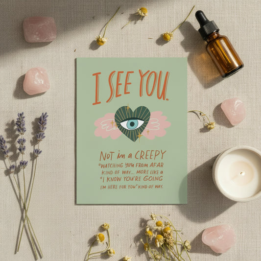 Card with 'I See You' text flat lay on a neutral textured background