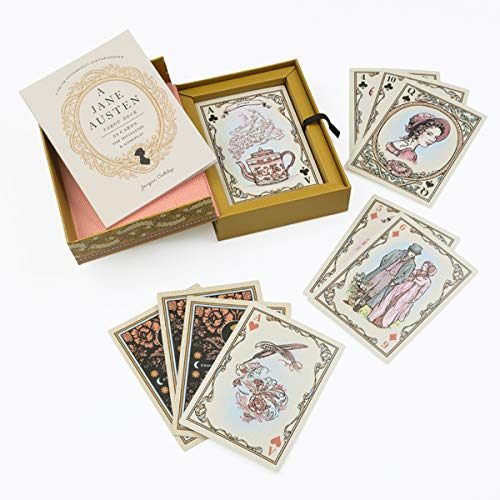 Set of playing cards with decorative designs and a Jane Austen book on a white background