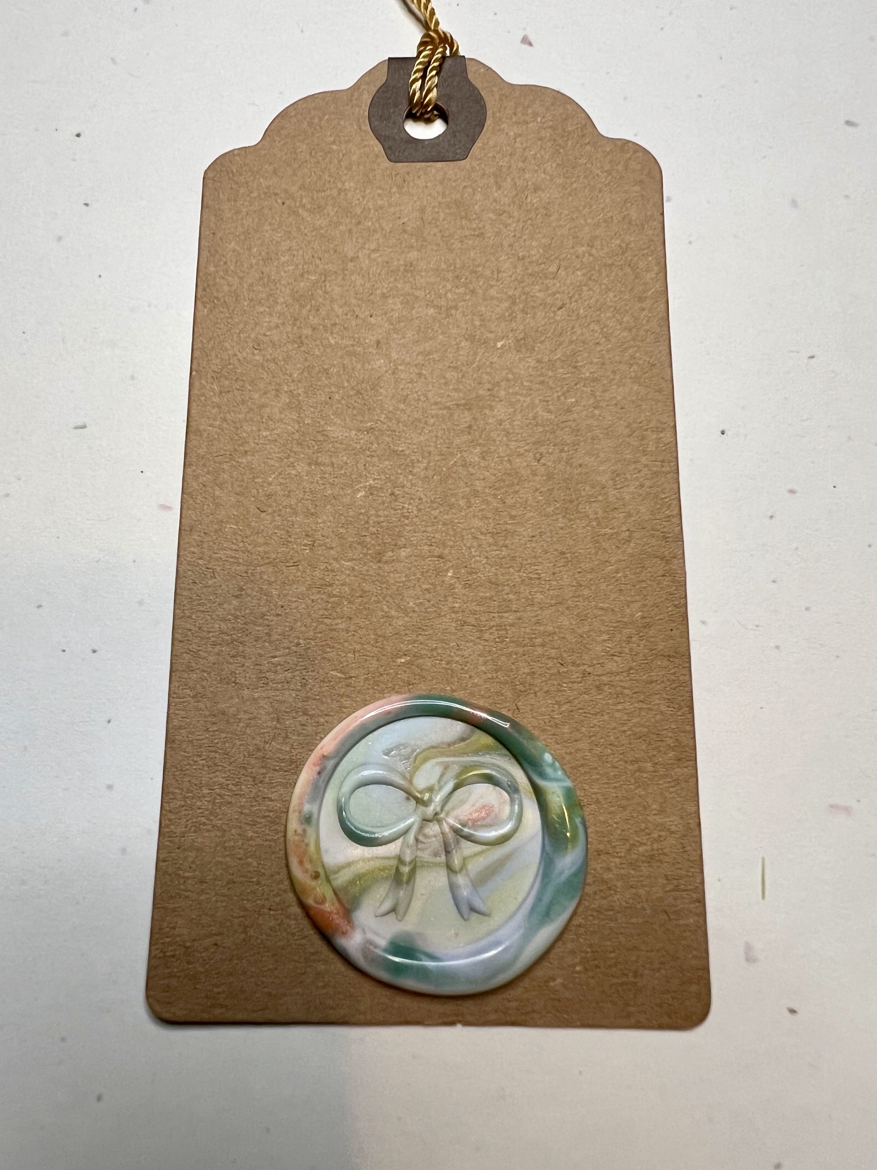 Set of four elegant gift tags featuring a timeless bow design, perfect for weddings and celebrations.