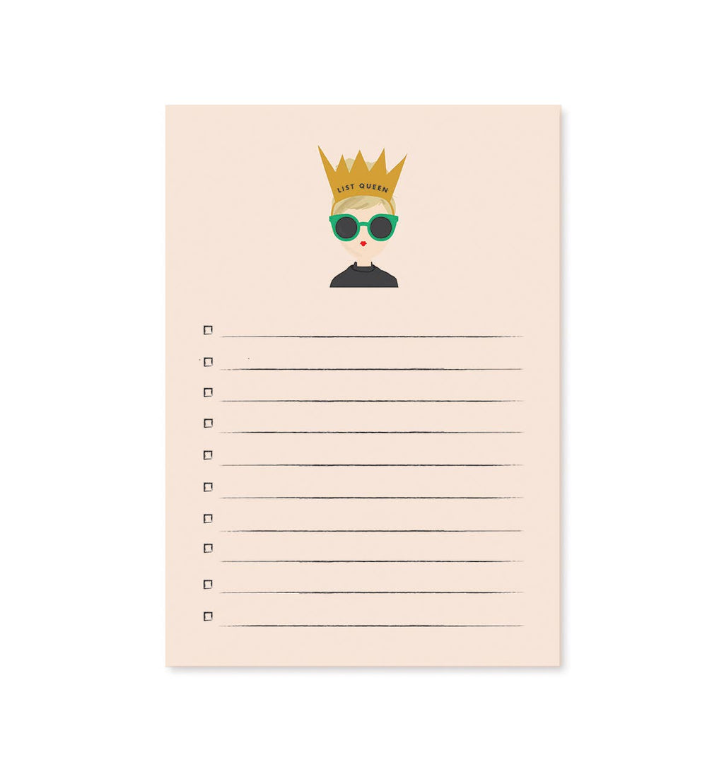 Notepad with a decorative cover featuring a person wearing a crown and sunglasses, on a white background