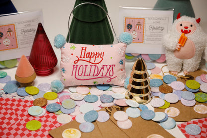 Display of Holiday decorations and Holiday wax seal stickers 