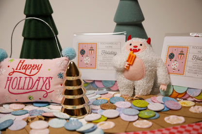 Secondary image of Christmas Yeti in a Christmas display surrounded by Holiday wax seals