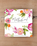 Image of the 31 Motherhood Postcards laying on a tabletop
