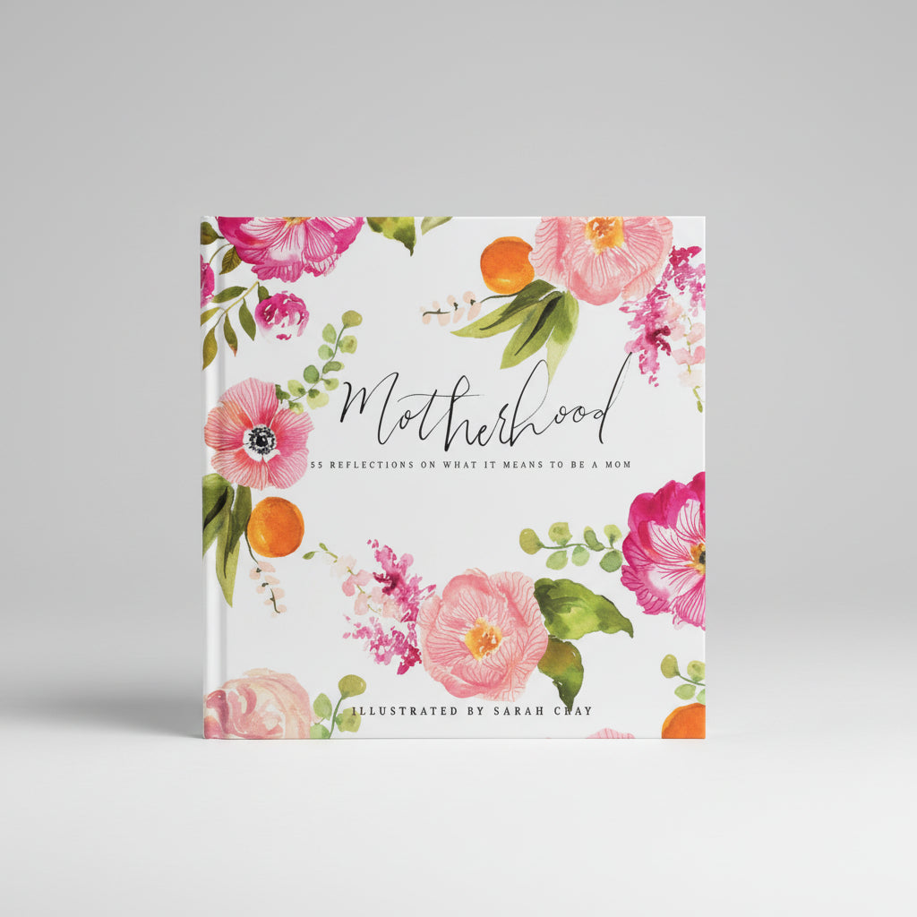 Image of the 31 Motherhood Postcards laying on a tabletop