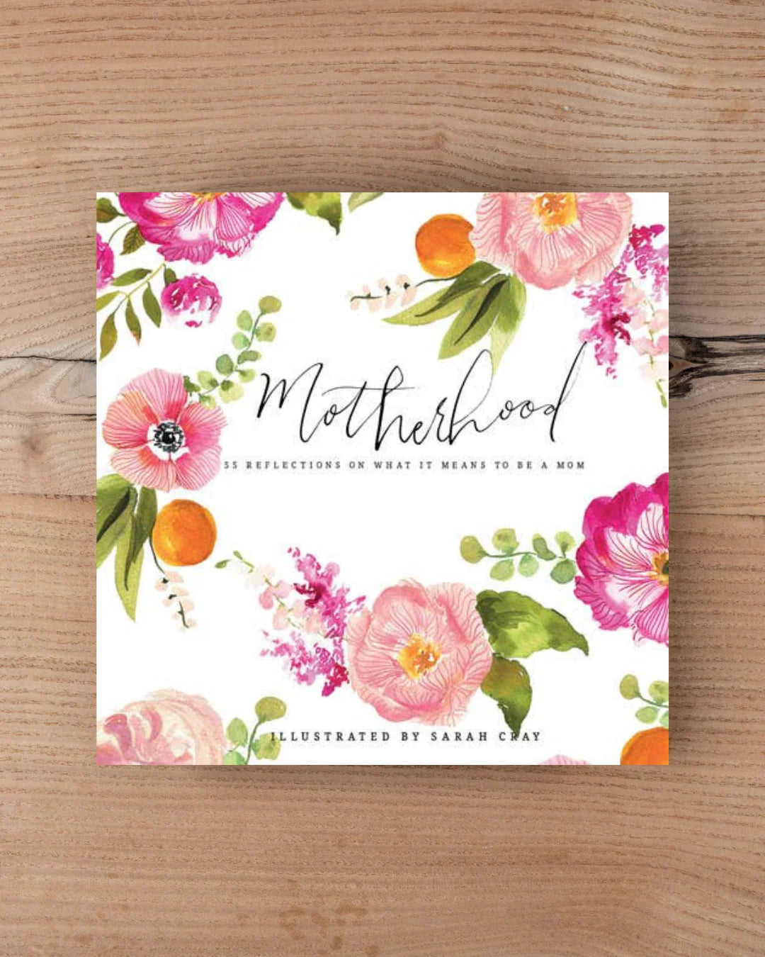 Image of the 31 Motherhood Postcards laying on a tabletop