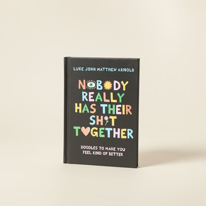 'Nobody Really Has Their Shit Together' book by Luke John Matthew Arnold on a white background