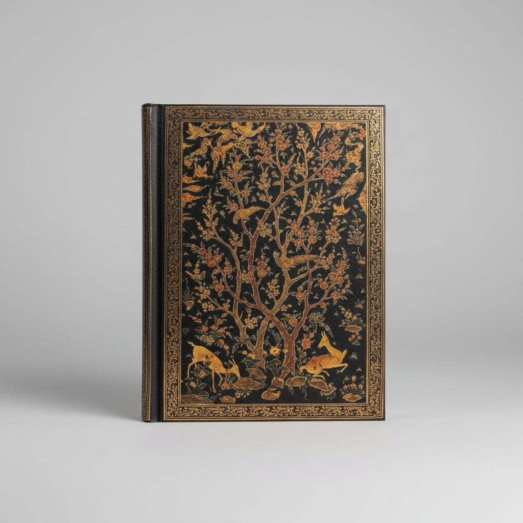 Image of the Persian Grove hardcover journal laying on a desk
