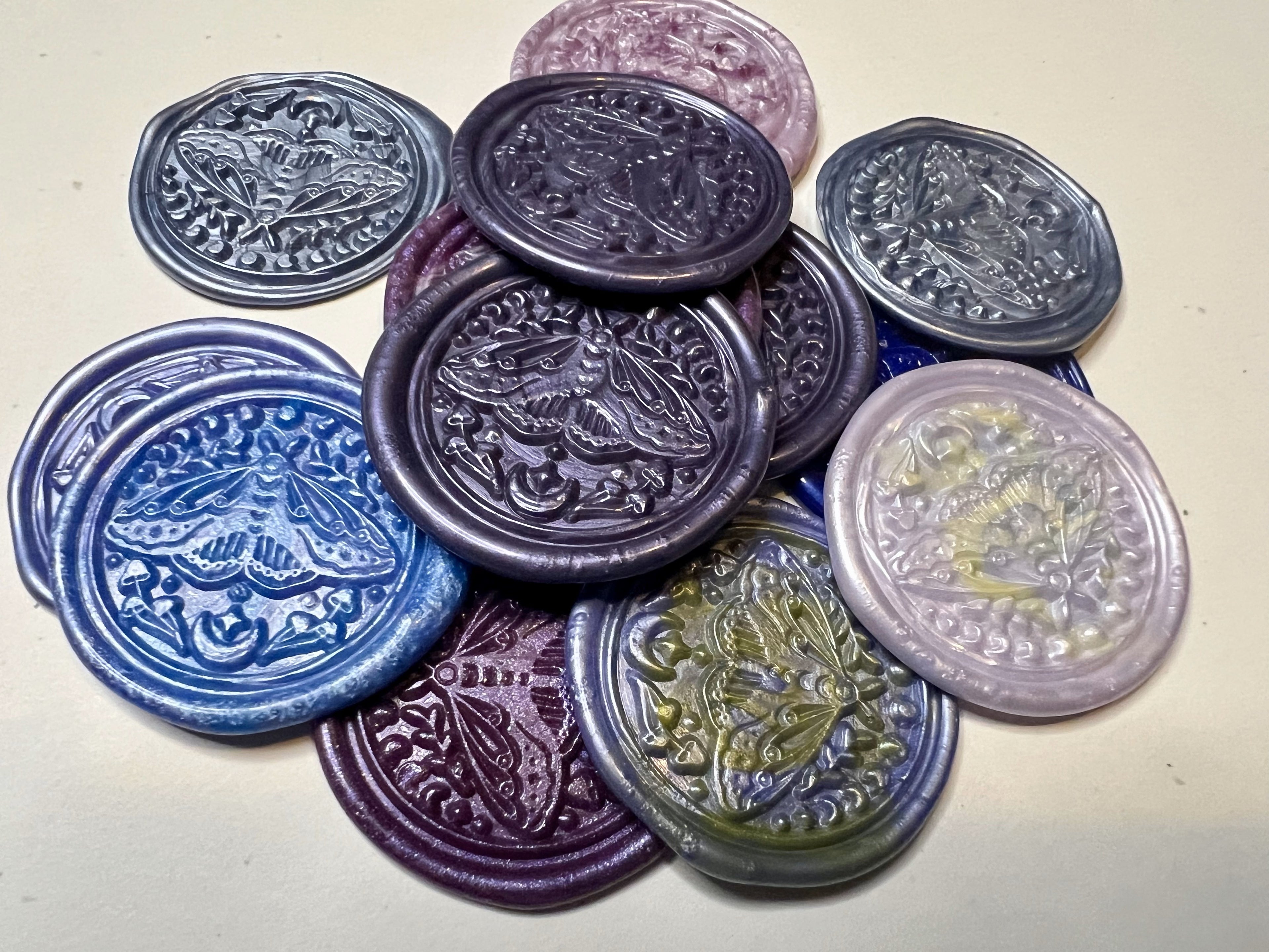Purple wax seal sticker with a detailed moth and moon design for spiritual or whimsical stationery