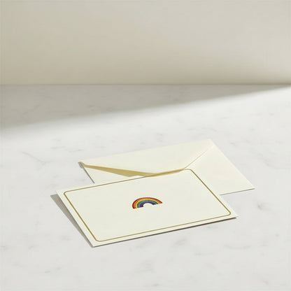 Close up view of the Rainbow embossed notecard with self seal envelope on table top