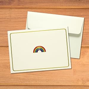 Close up view of the Rainbow embossed notecard with self seal envelope on table top
