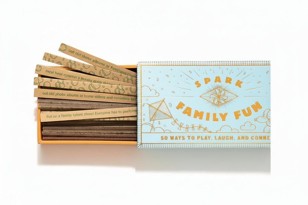 Product packaging with text '50 prompts to spark fun in your family life' on a white background