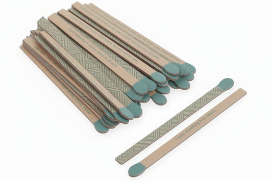 Set of paper faux matchsticks with creative prompts on a white background