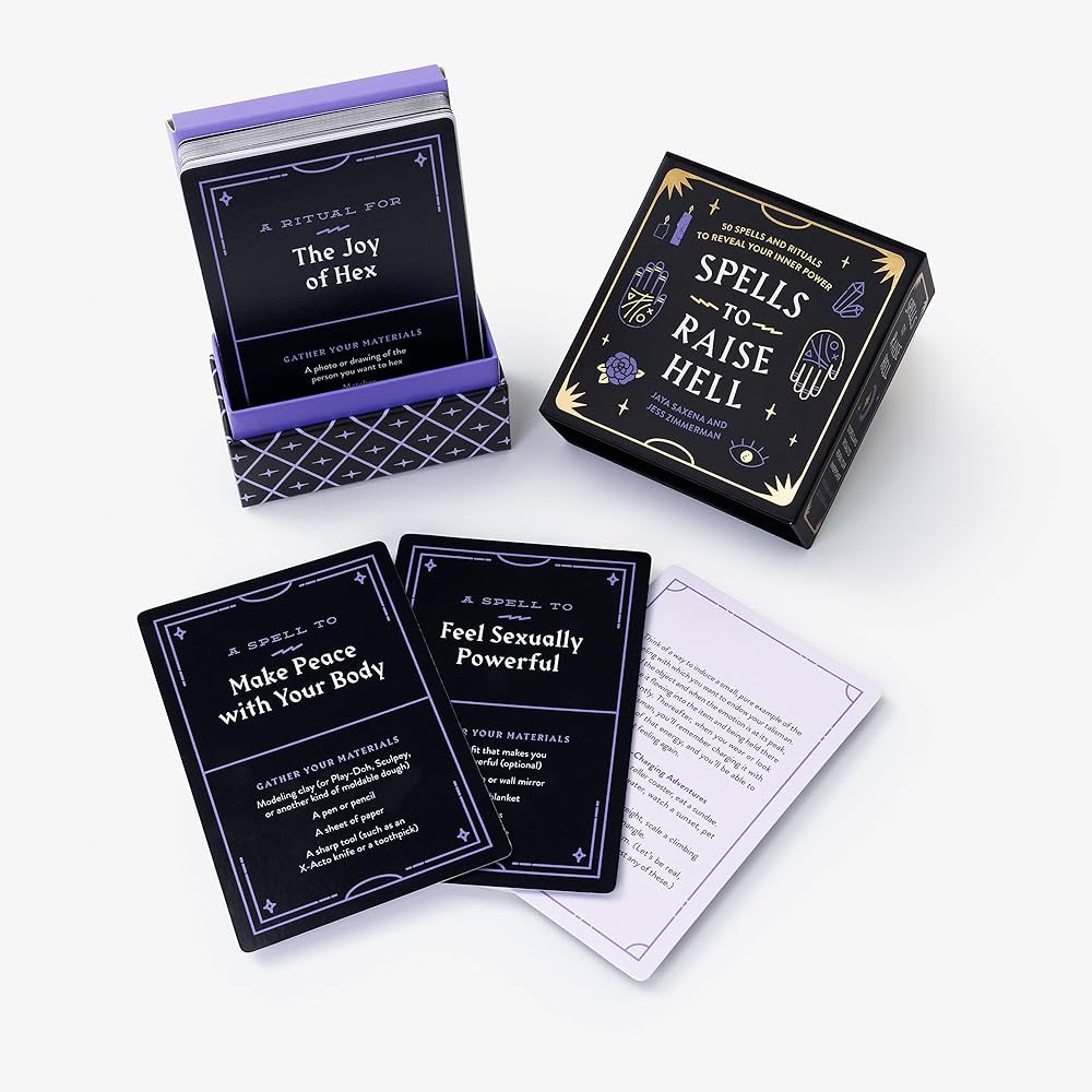 Ritual card spread showing front artwork and back spell instructions
