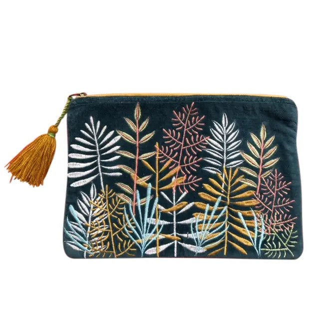 Embroidered pouch with leaf patterns and a tassel on a white background