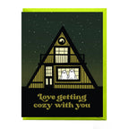 Illustration of a cozy A-frame cabin on the "Cozy Love Greeting Card"