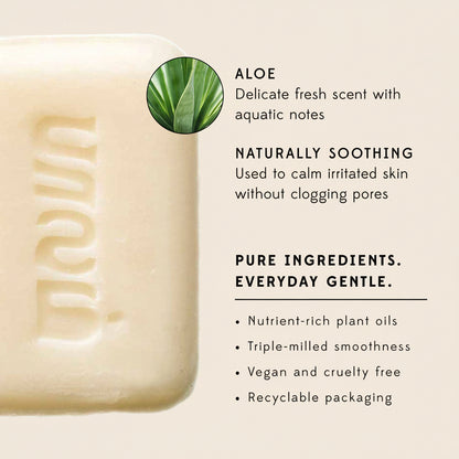Bar of soap with branding and aloe vera information on a white background