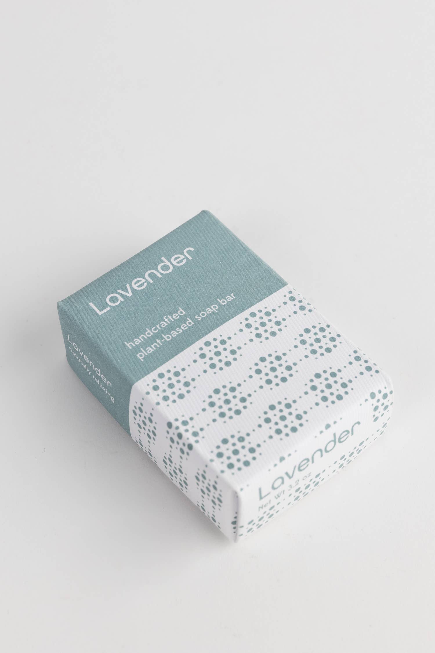 Box of lavender soap on a light gray background