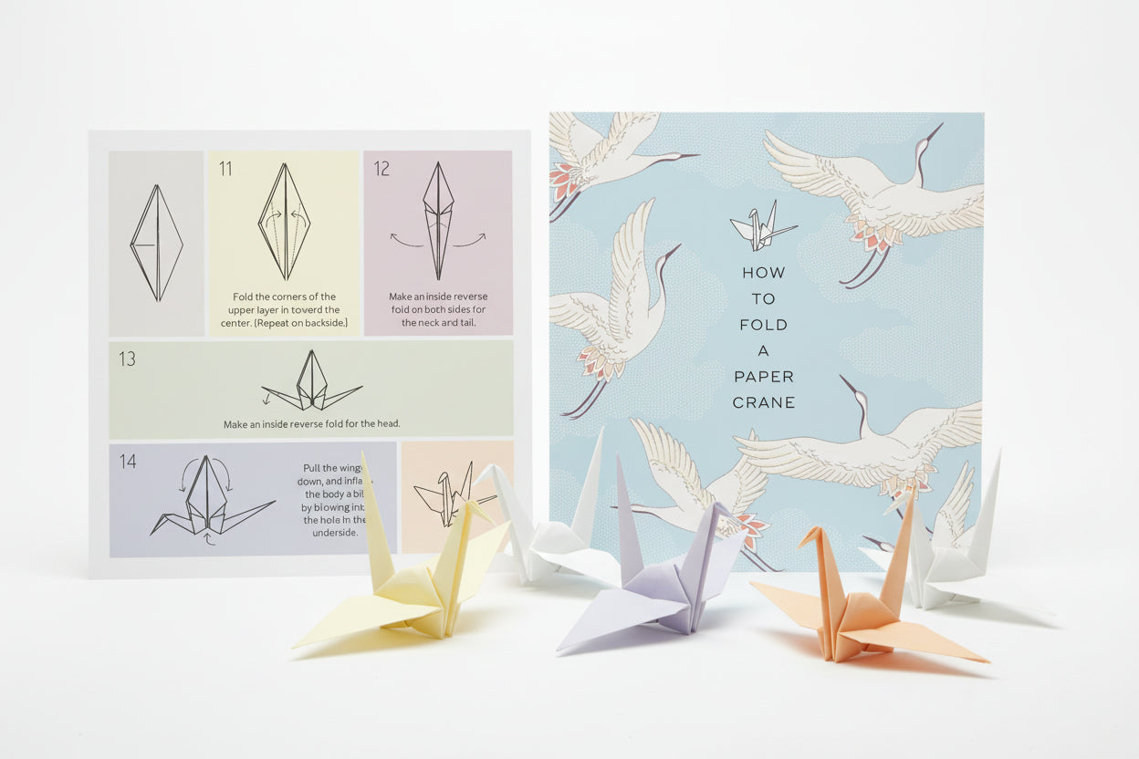 Instructions on how to fold a paper crane with illustrations of cranes.