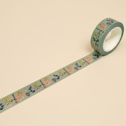 Roll of soft green washi tape with various mushrooms and various colors
