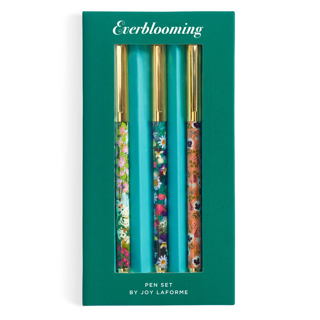 Trio of Joy Laforme floral pens with metallic gold caps arranged in a blooming flower shape