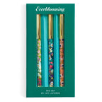 Trio of Joy Laforme floral pens with metallic gold caps arranged in a blooming flower shape