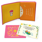 Open book with colorful illustrations and text on a white background
