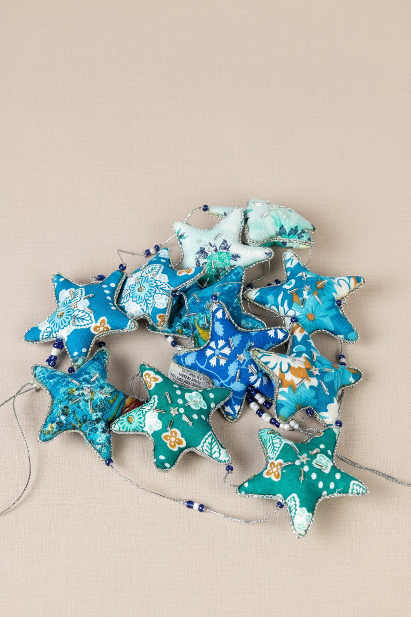 Close up view of the Embroidered Star Garland showing the beaded details