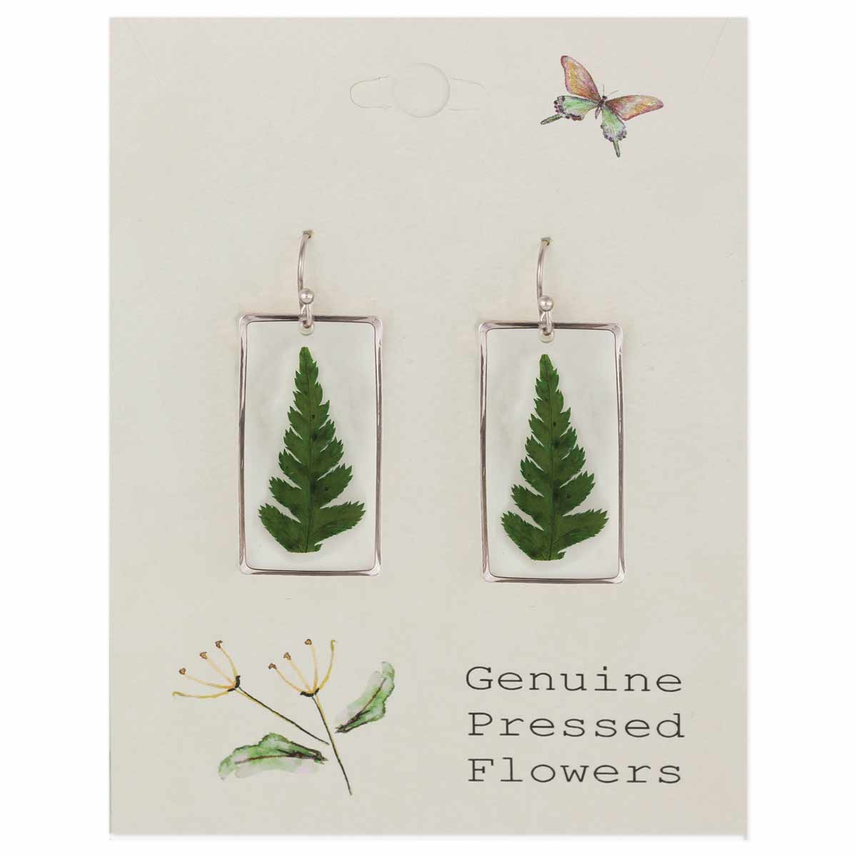 Earrings with pressed fern leaves on a card labeled 'Genuine Pressed Flowers'.