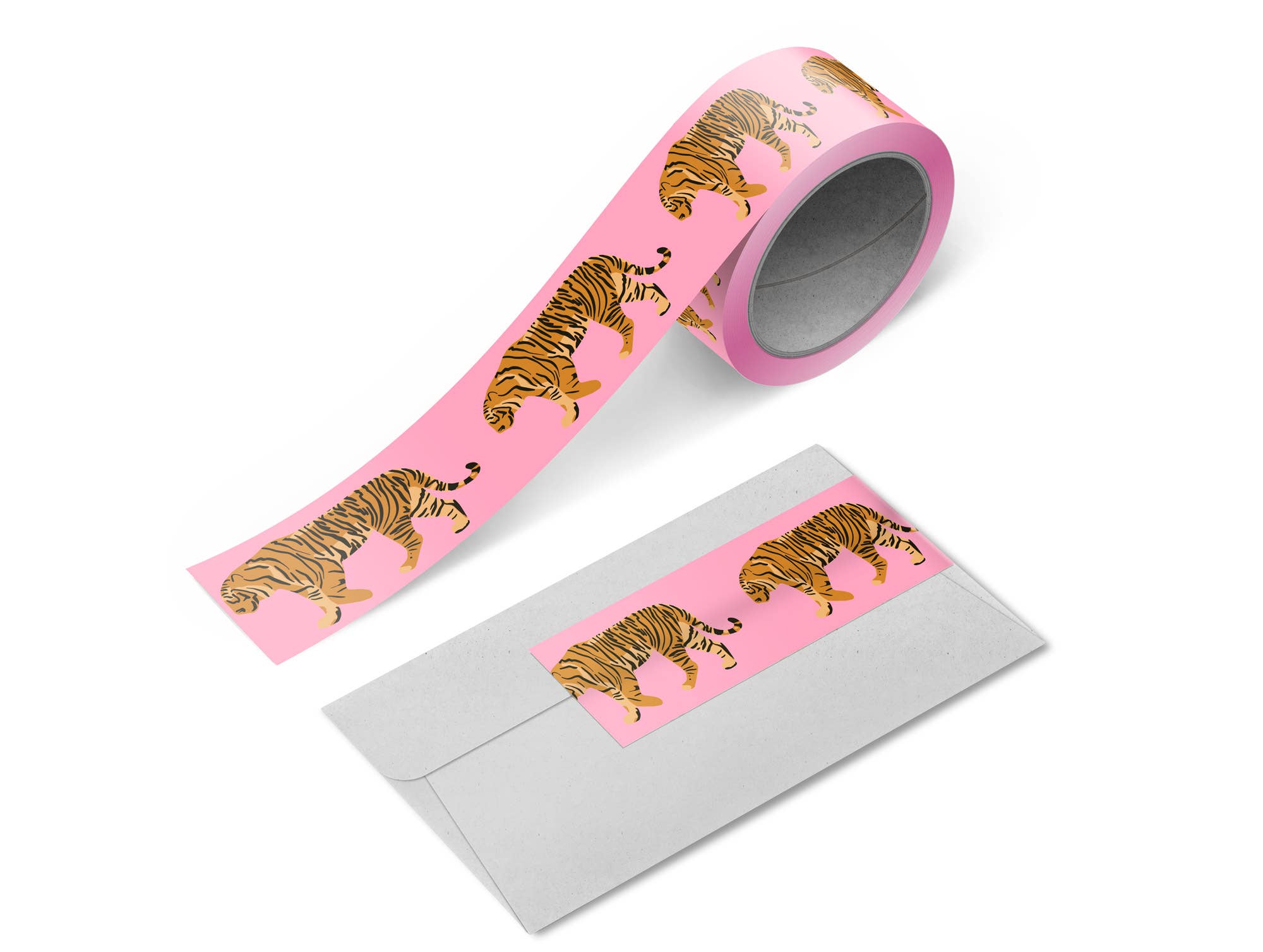 Close-up of washi tape unspooled across an envelope flap
