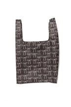 Chocolate brown tote bag with a bow pattern