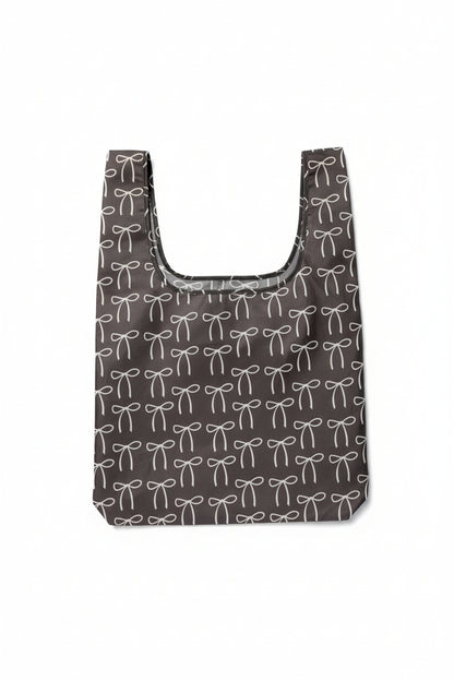 Chocolate brown tote bag with a bow pattern