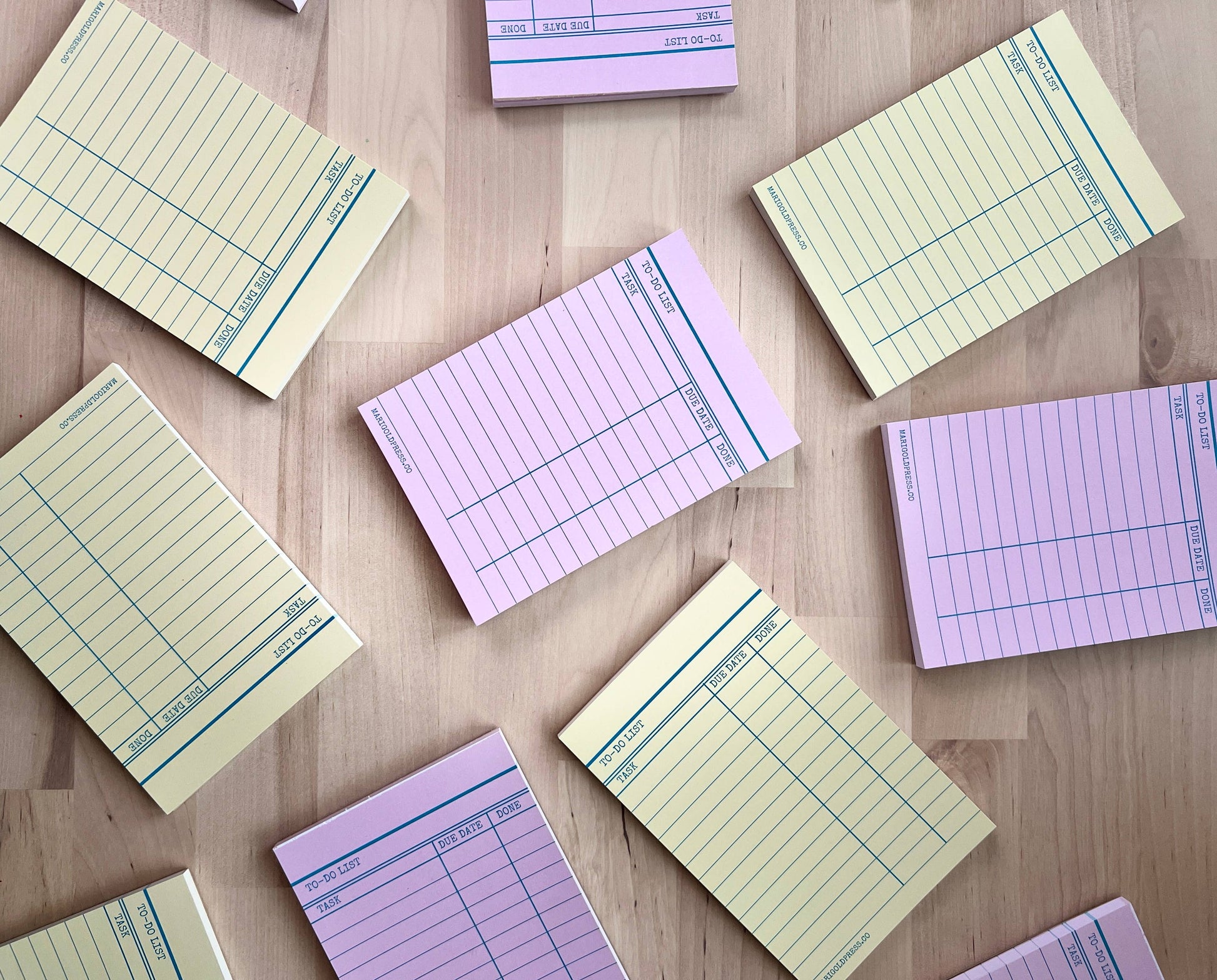 Library card memo pads in yellow and pink colors