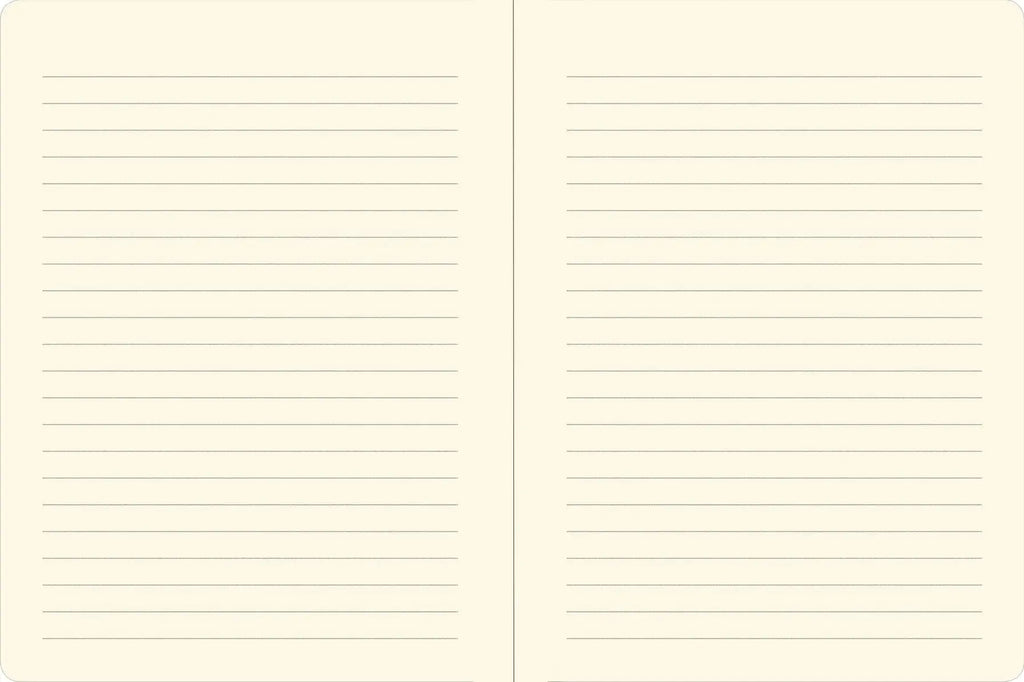 Open journal showing lined pages with interior mushroom-themed endpapers