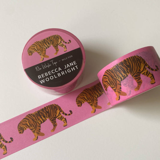 Roll of Wild Side Washi Tape showing bold tiger design on pink background